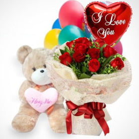 1 dozen Holland Roses with 8″ inches Teddy Bear and 1 Mylar “I Love You” Ballon