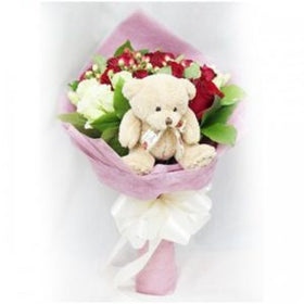 1 dozen Red Holland Roses with Mini Teddy Bear in a bouquet