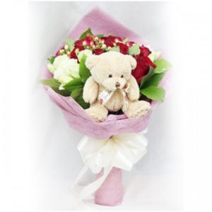 1 dozen Red Holland Roses with Mini Teddy Bear in a bouquet