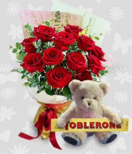 1 dozen Red Holland Roses with Teddy Bear 4″ inches and Toblerone 100g