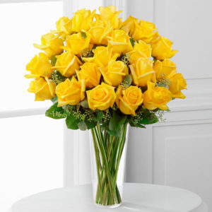 2 dozen Yellow Holland Roses in a Vase