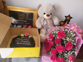 1 Dozen Roses in a  Pink Bouquet with Chocolate Dedication cake and Beautiful 16